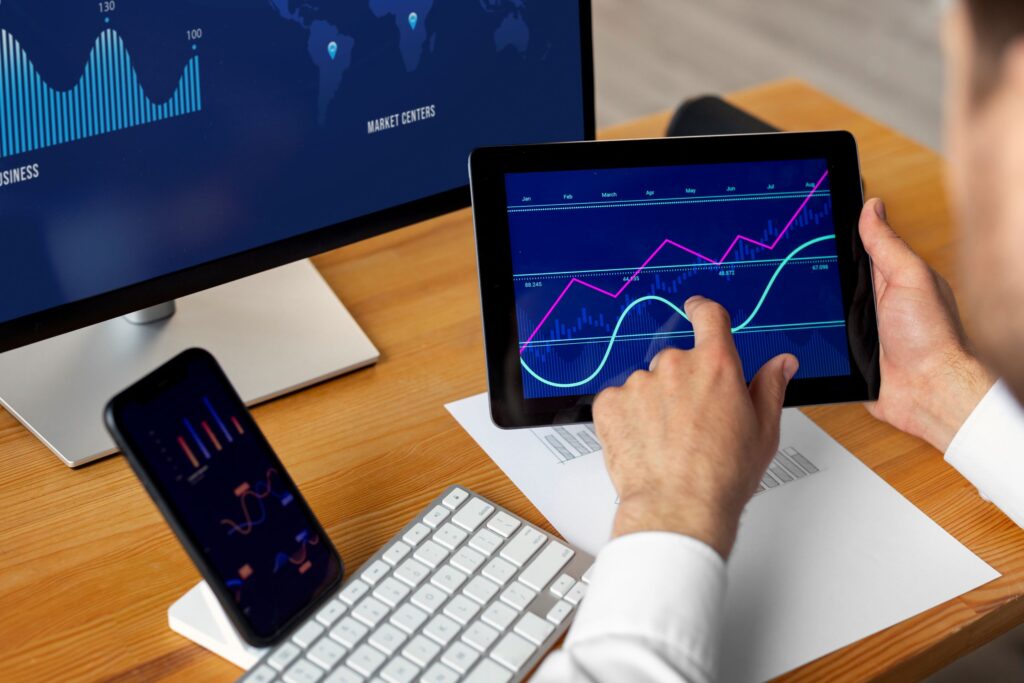 person-looking-finance-graphs-size